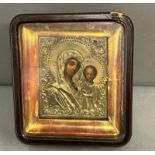 A Russian icon in glazed case 18cm x 20cm