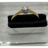 An 18ct, marked 750 diamond ring, size P1/2