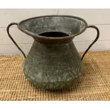 A hammered copper two handled pot (H62cm Dia 32cm)