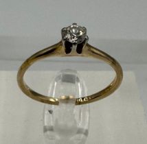 A 9ct gold and diamond ring, approximate size O