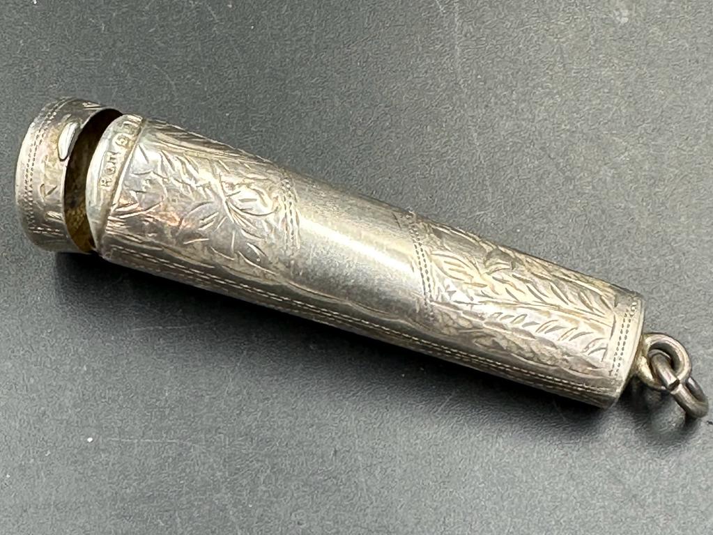 A hallmarked silver cheroot holder by Henry Clifford Davis, hallmarked for Birmingham 1908.