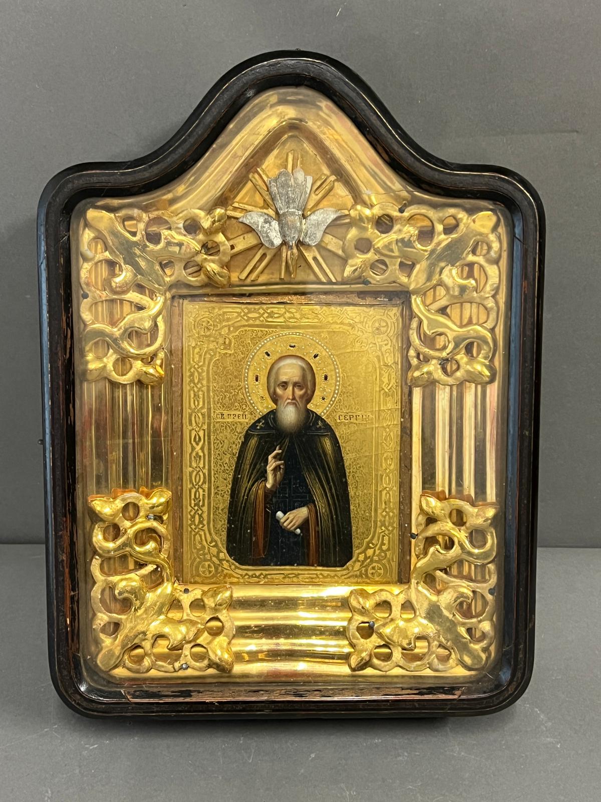 A Russian icon in a gazed case 27cm x 36cm