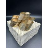 A boxed set of six Continental silver napkin rings