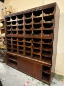 A mahogany haberdashery unit comprising of 48 drawers and cupboard under height 198 and 187x51