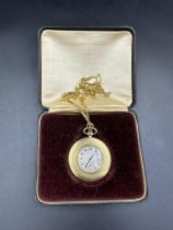 An 18ct gold Longines 16 Jewels pocket watch on an 18ct fancy link chain, marked 750 505mm in