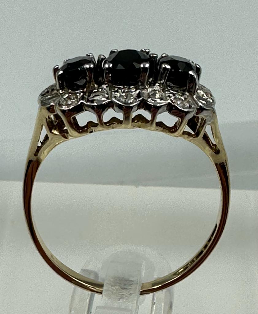 A 9ct gold diamond and sapphire ring, approximate size M1/2 - Image 2 of 5