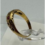 An antique 18ct gold diamond and ruby inset ring, approximate size m and weight 2.4g