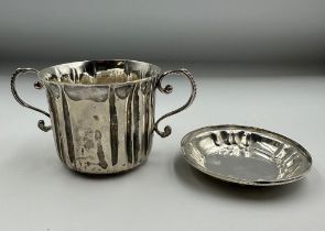 A silver lidded sugar bowl marked to base Carrington & Co 130 Regent Street, hallmarked London 1892,