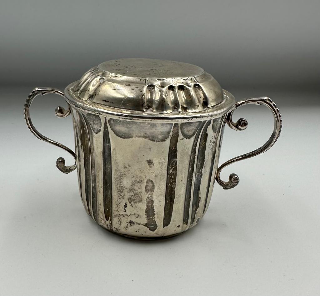 A silver lidded sugar bowl marked to base Carrington & Co 130 Regent Street, hallmarked London 1892, - Image 2 of 4