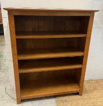 A light oak open bookcase (H124cm W100cm D35cm)