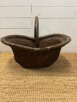 A Chinese rustic woven bucket 47cm x 66cm