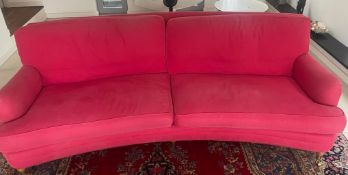 A Norell sofa with curved shape in pink (H80cm W230cm D80cm)