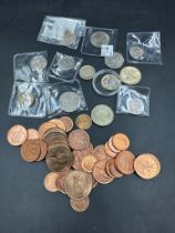 A quantity of commemorative decimal UK coins and some uncirculated pre decimal