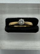 An 18ct diamond ring on yellow gold setting Size P