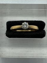 An 18ct diamond ring on yellow gold setting Size P