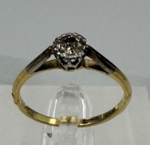 An 18ct gold diamond ring, approximate size N