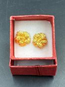 A pair of high carat gold floral themed earrings (Approximate Total Weight 3.6g)