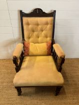 An Edwardian chair with spindle sides and button back