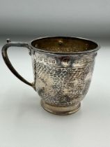 A hammered Art Deco silver cup by Barker Brothers (Herbert Edward Barker & Frank Ernest Barker)