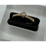 A 9ct gold diamond ring, approximate size N, (2.6g)