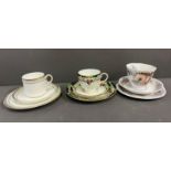 A trio of cups and saucers and side plates
