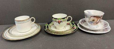 A trio of cups and saucers and side plates