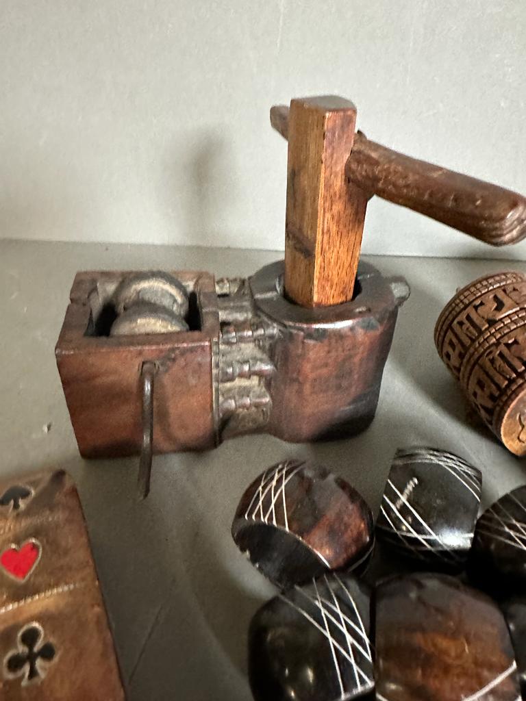 A selection of curios to include Buddhist prayer wheels, a bronze bell and coasters - Image 5 of 6