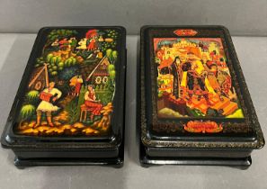 Two lacquered boxes with village scene to front (17cm x 12cm)