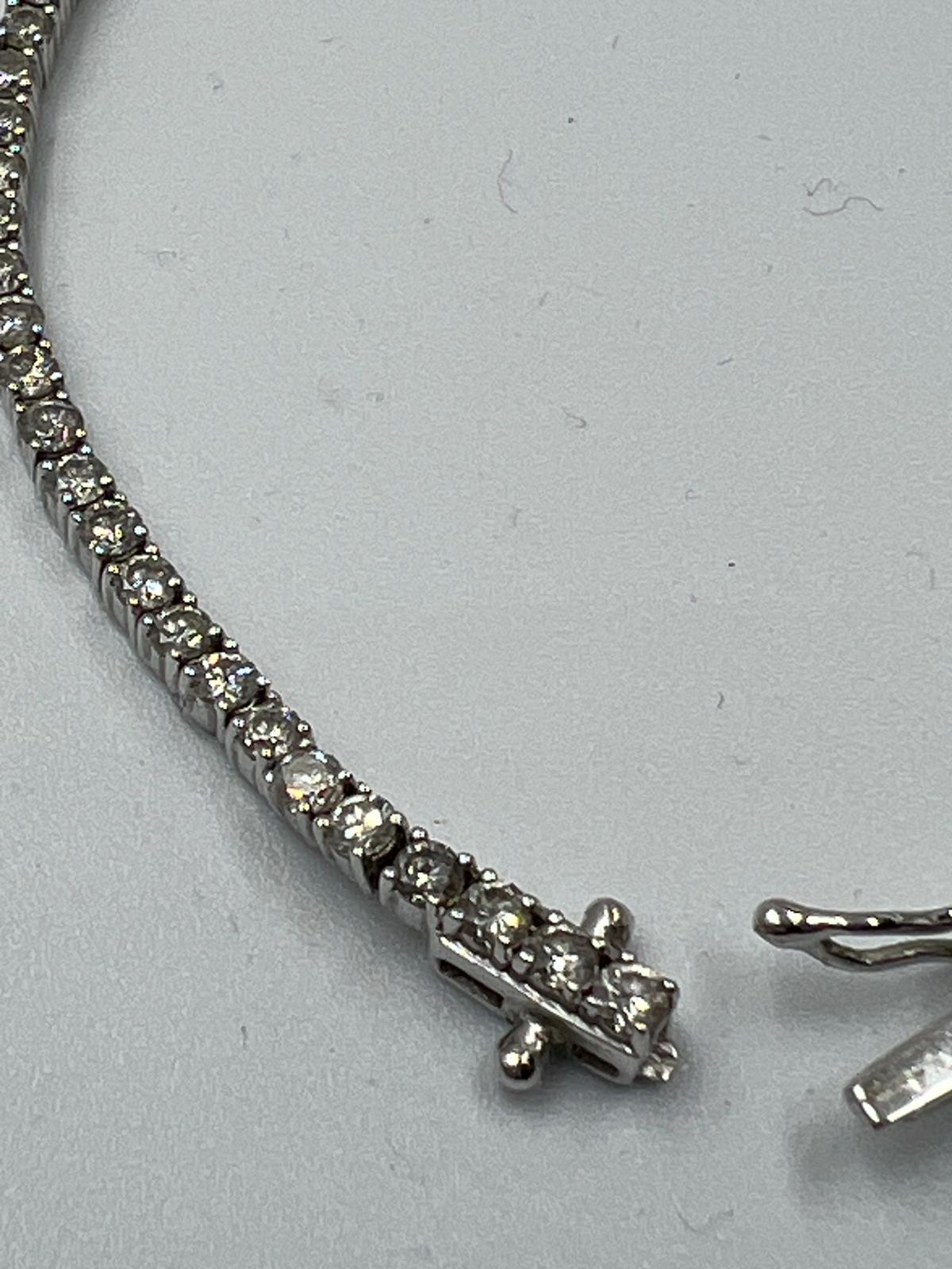 An 18ct white gold Tennis or line bracelet set with approximately 3ct of diamonds. - Image 5 of 25