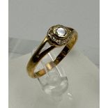 A 22ct gold Victorian ring with central diamond, approximate total weight 2.6g, size P