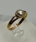 A 22ct gold Victorian ring with central diamond, approximate total weight 2.6g, size P