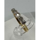 A five stone antique diamond ring on platinum and gold setting Size N