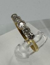 A five stone antique diamond ring on platinum and gold setting Size N