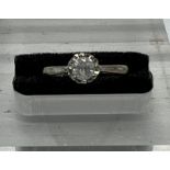 A 9ct white gold and diamond ring, size H