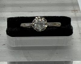 A 9ct white gold and diamond ring, size H