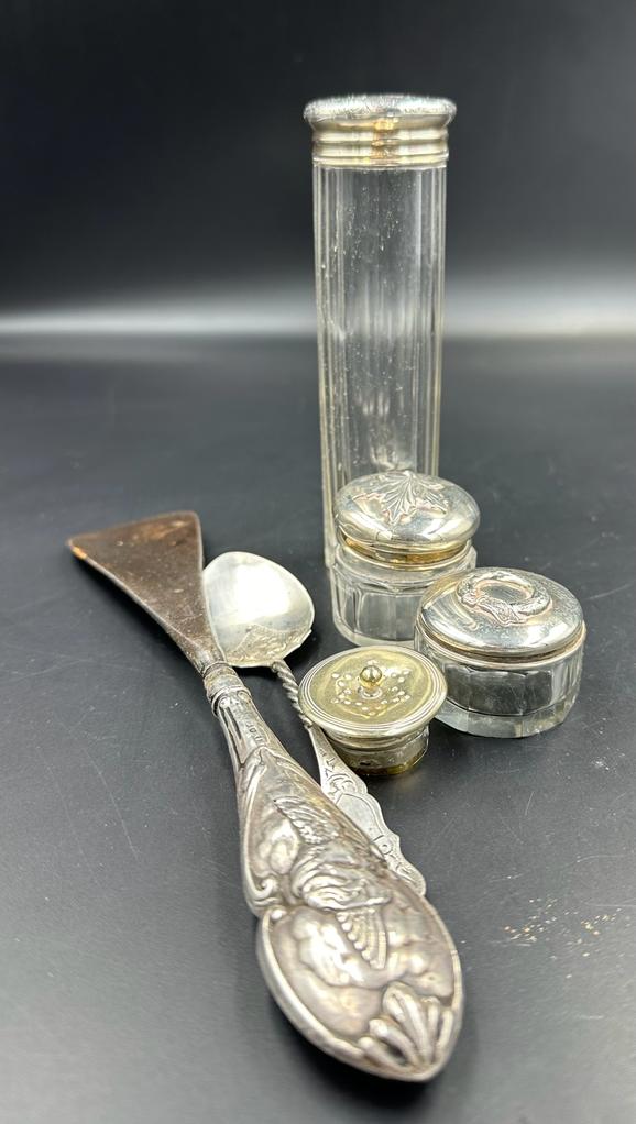 A selection of silver curios to include a dressing table silver topped jars (3), silver handled shoe