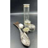 A selection of silver curios to include a dressing table silver topped jars (3), silver handled shoe