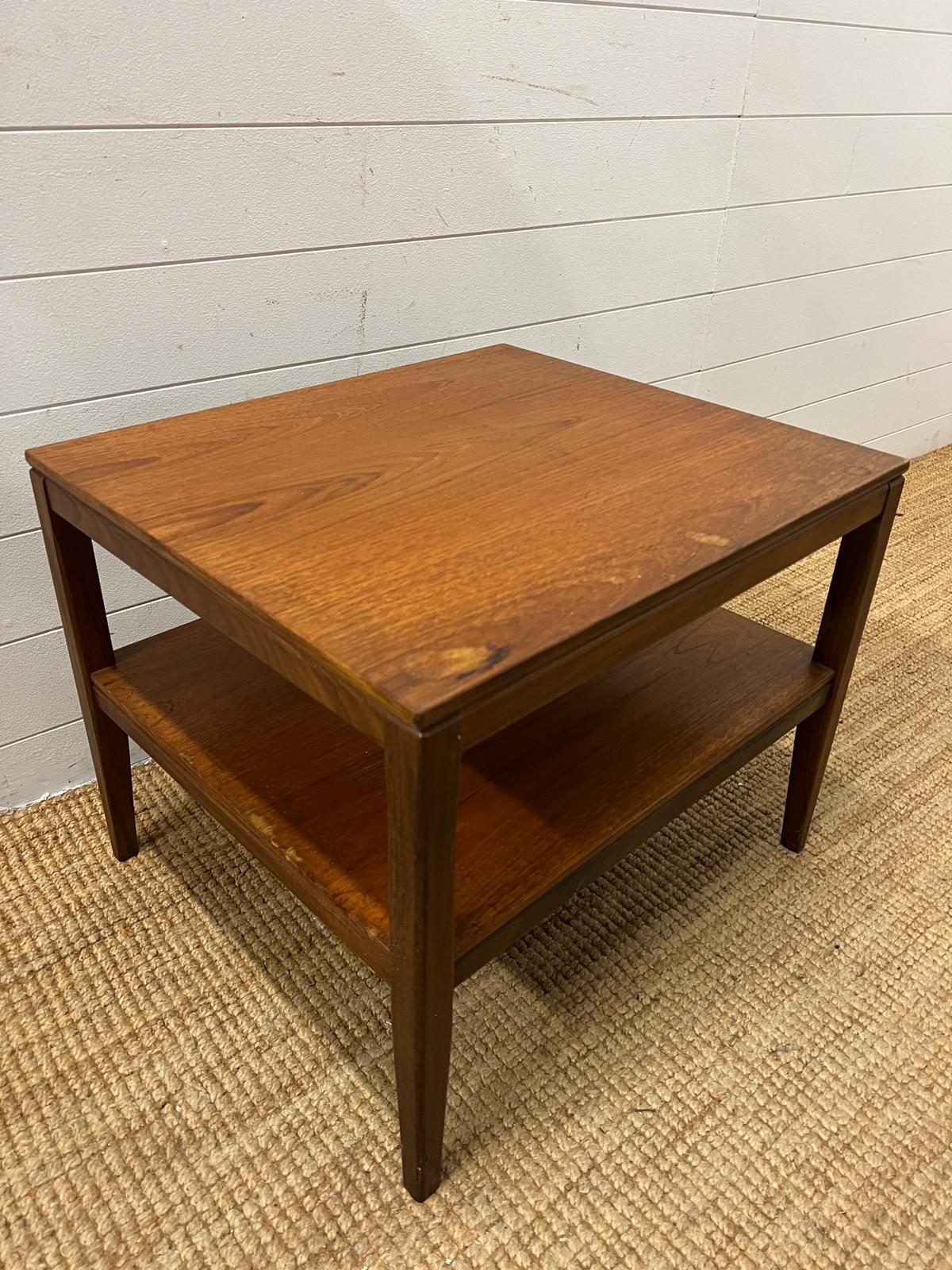 A Mid Century teak side table on tapering legs and shelf under (H48cm W61cm D54cm) - Image 3 of 3