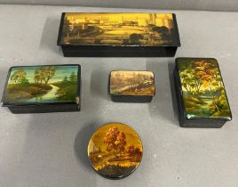 Five lacquered boxes with country and town scene