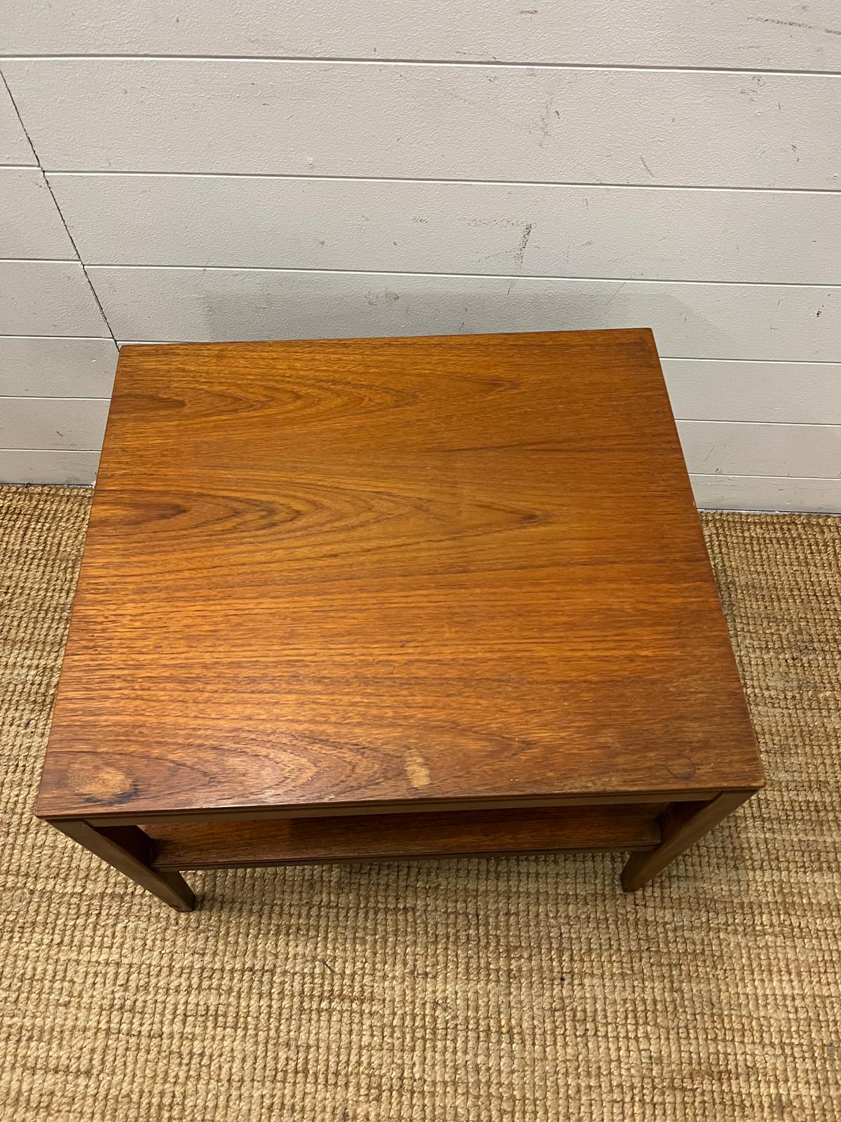 A Mid Century teak side table on tapering legs and shelf under (H48cm W61cm D54cm) - Image 2 of 3