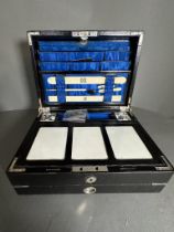 A Victorian, silver mounted Morocco leather writing compendium by P & E Schafer. Hallmarked for c.