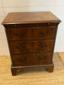 A small Georgian style chest, rectangular moulded over three drawers fluted sides and bracket