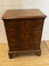 A small Georgian style chest, rectangular moulded over three drawers fluted sides and bracket