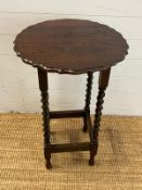 A piecrust side table on barley twist legs (H72cmDia48cm)