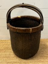 A Chinese woven carrying basket