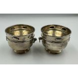 A Pair of Art Nouveau salts by William Hutton & Sons Ltd, hallmarked for Birmingham 1909 and