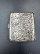 A silver, engraved cigarette case, hallmarked for Birmingham 1927, makers mark E & S.