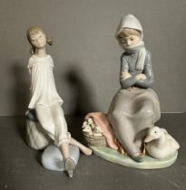 Two boxed Lladro figures, a girl keeping warm with ducklings and a reclining girl in night clothes