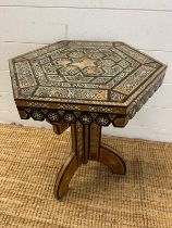 An octagonal inlaid side table (H50cm Dia37cm)