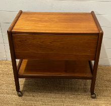 A vintage teak drinks trolley (H67cm W68cm D45cm)